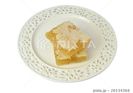 Hresh honeycomb on fine porcelain plate, on white 26534368