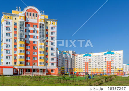 Playground in front of multi-storey house Playground in front of multi-storey house 26537247