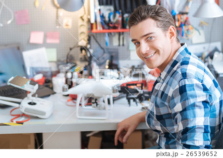 Portrain of handsome man working with drone Portrain of handsome man working with drone 26539652