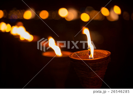 Traditional wooden torch flame at night Traditional wooden torch flame at night 26546285