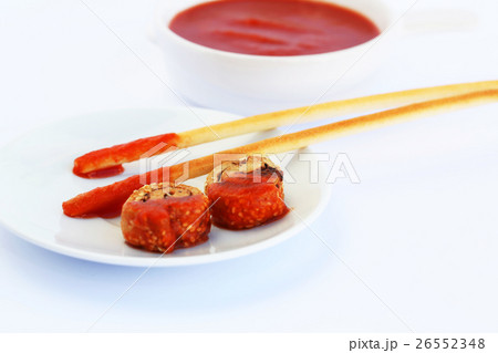 Rusks with sesame seeds, bread sticks and sauce 26552348
