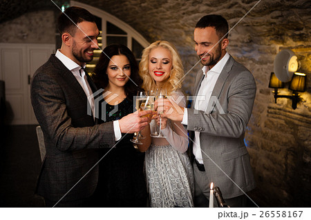 Four friends celebrating 26558167