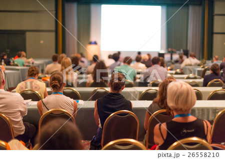 Audience in lecture hall participating at business 26558210