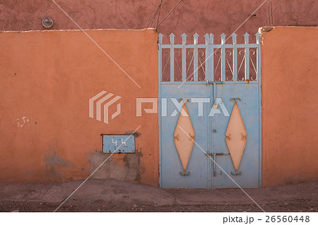 Orange fence and a blue gate, Morocco 26560448
