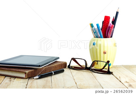 Glasses tablet and office supply on wooden table 26562039
