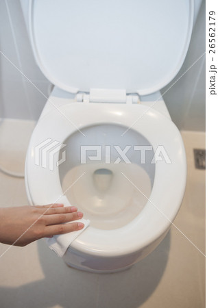 cleaning on toilet. 26562179