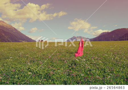 Naked female in a red scarf in a field at sunset 26564863