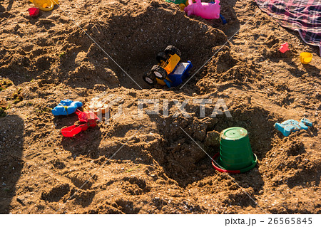 Toys on the beach. 26565845