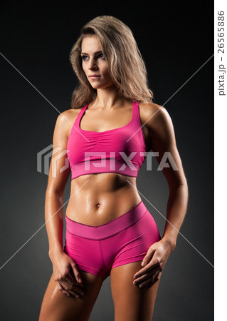 Beautiful sportive female posing in sportswear Beautiful sportive female posing in sportswear 26565886