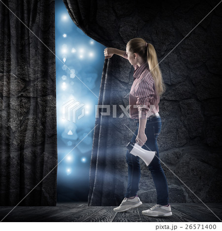 young woman looking at the scene young woman looking at the scene 26571400
