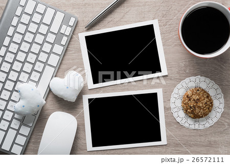 Blank photo frames on table Blank photo frames on table 26572111