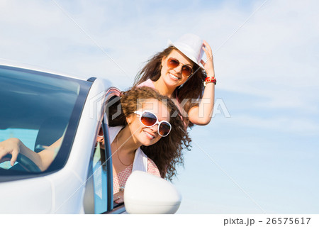 young attractive woman in sunglasses young attractive woman in sunglasses 26575617