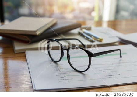 Analysis chart and paperwork on office table 26585030