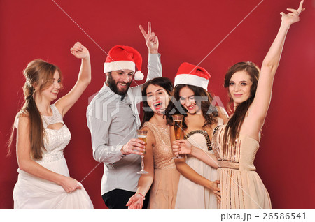 Girls and man with a glass of champagne 26586541