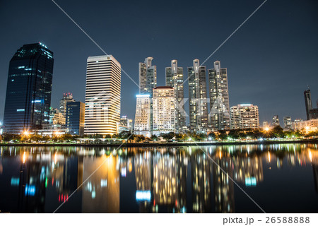 Bangkok city downtown at night with reflection Bangkok city downtown at night with reflection 26588888