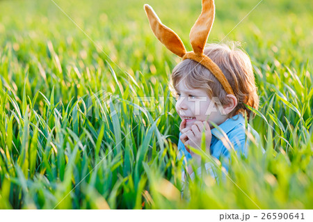 little kid boy having fun with traditional Easter little kid boy having fun with traditional Easter 26590641