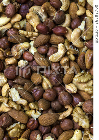 Background mix of nuts and raisins shot close-up Background mix of nuts and raisins shot close-up 26592700