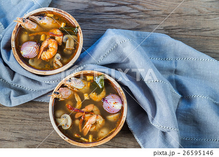 Two bowls of thai tom yum soup Two bowls of thai tom yum soup 26595146