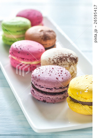 Colorful macarons on the white plate Colorful macarons on the white plate 26595417