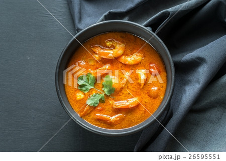 Bowl of thai yellow curry with seafood 26595551