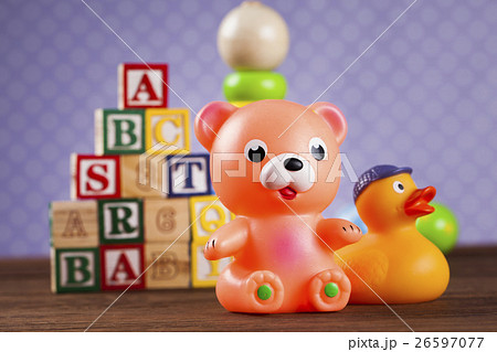 Children's of toy accessories on wooden background Children's of toy accessories on wooden background 26597077