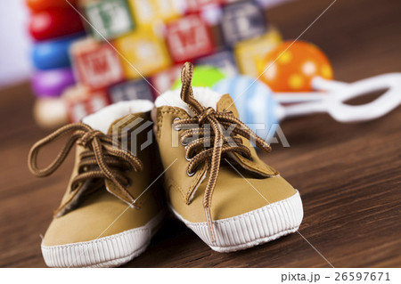 Stuffed baby toys on wooden background Stuffed baby toys on wooden background 26597671