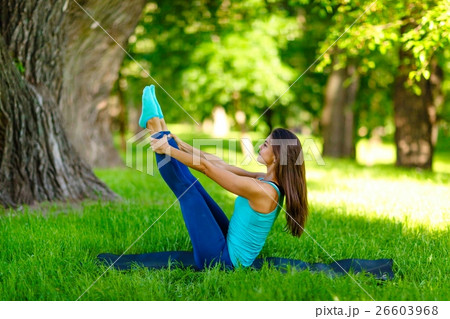 Yoga woman on green grass Yoga woman on green grass 26603968