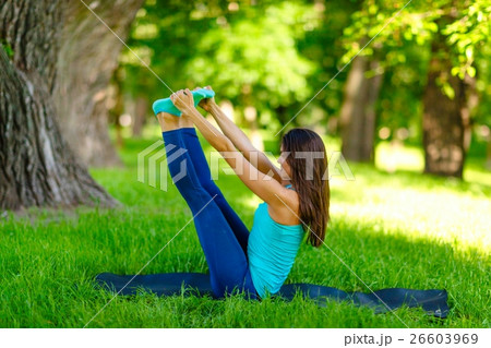 Yoga woman on green grass Yoga woman on green grass 26603969