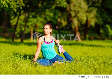 Yoga woman on green grass Yoga woman on green grass 26604136