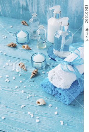 White flowers lying on and candle Spa set White flowers lying on and candle Spa set 26610983