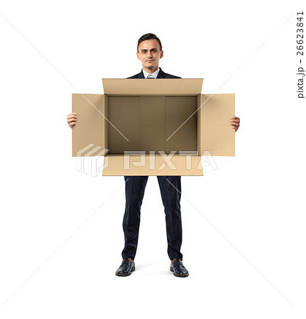 Businessman standing and holding big open empty Businessman standing and holding big open empty 26623841