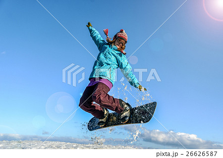 Girl jumping on the lake 26626587