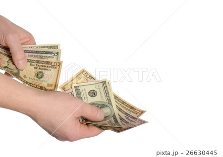 Dollars in a man's hand isolated on white Dollars in a man's hand isolated on white 26630445