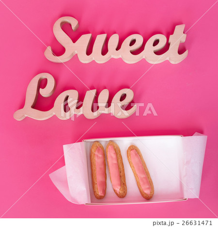 Words sweet love, wooden letters on pink paper Words sweet love, wooden letters on pink paper 26631471