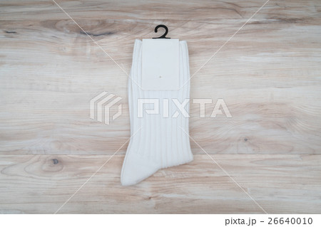 Socks on wooden background . Socks on wooden background . 26640010