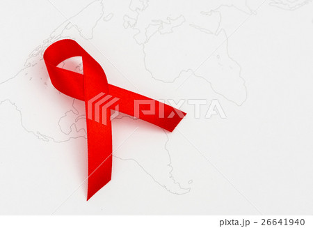 Aids Awareness Red heart Ribbon on world map . Aids Awareness Red heart Ribbon on world map . 26641940