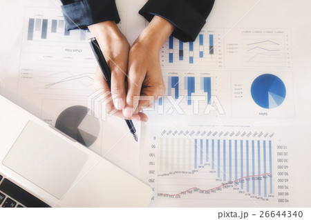 Business woman working at office with documents Business woman working at office with documents 26644340
