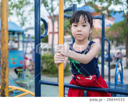 asian baby child playing on playground 26644555
