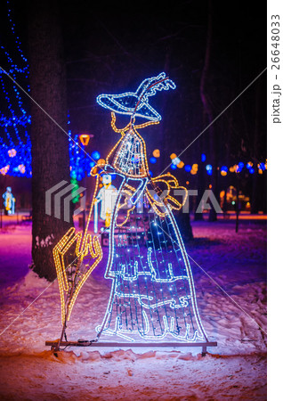 Christmas illumination in the Park - woman with 26648033