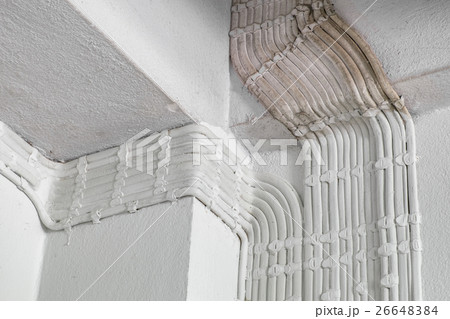 Electric wire white organize on wall 26648384