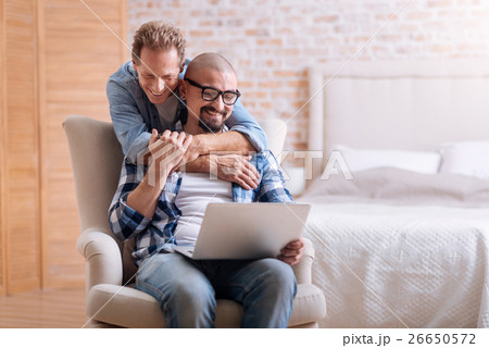 Happy gay couple expressing their love to each Happy gay couple expressing their love to each 26650572