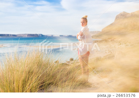 Free Happy Woman Enjoying Last Autumn Sun on 26653576