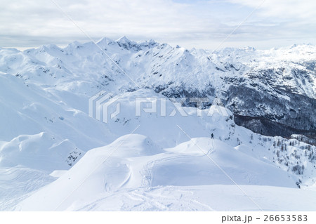 Freeride snowboarder on the top of the mountain. 26653583