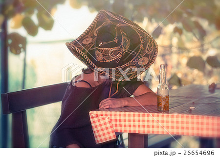 Mexican woman sleeping leaning on table Mexican woman sleeping leaning on table 26654696