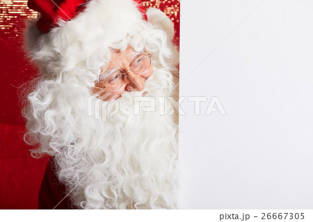 Santa Claus pointing in blank advertisement banner 26667305