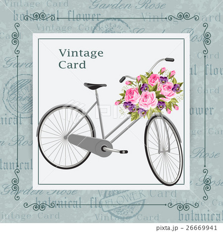 Gray bicycle with a basket full of flowers 26669941