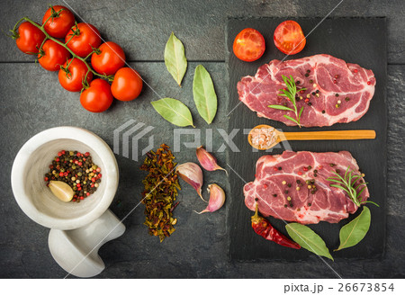 raw beef steak with spices top view raw beef steak with spices top view 26673854