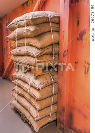 Pallets of merchandise bags stacked in storage Pallets of merchandise bags stacked in storage 26675494