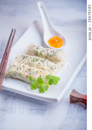 Spring Rolls with Sauce served on the plate Spring Rolls with Sauce served on the plate 26676585