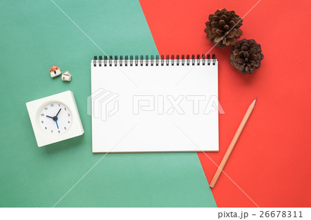 Top view of notebook on red green Christmas 26678311